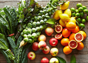 a group of fruits and vegetables on a wood surface Healthy Weight Loss Diets Maidenhead